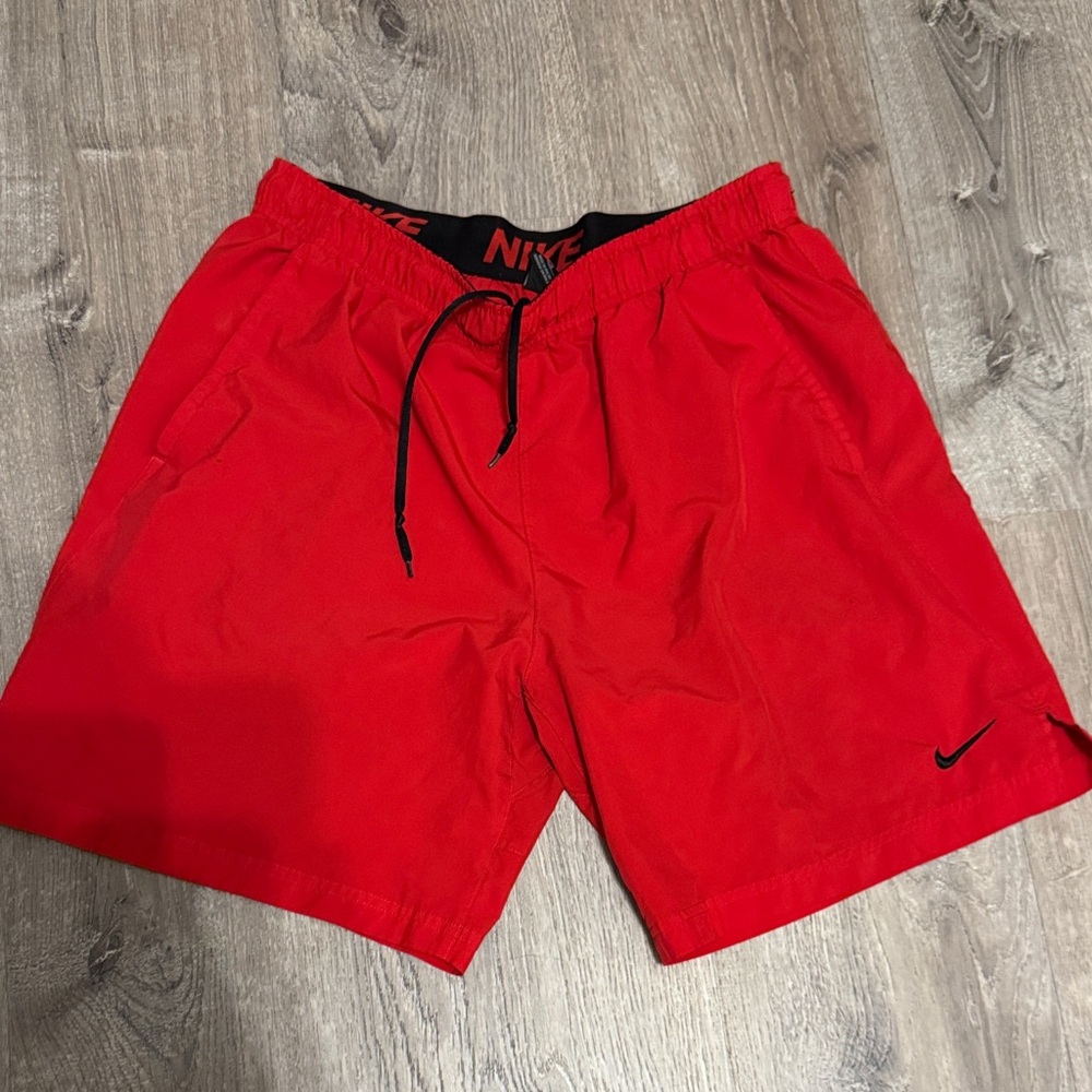 Nike Red Dri Fit shorts woven swoosh Size XL - small hole